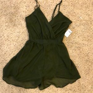 A cute green romper! Brand new
